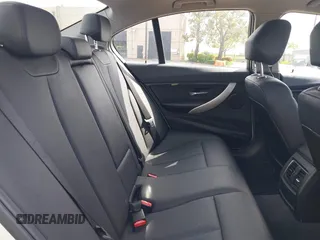 2016 BMW 3 Series 320i with VIN WBA8A9C52GK617133, listed as a IAAI auction lot 42029140 with 59,113 mi miles. Bid and sale history available at carsss.com. Image 8.