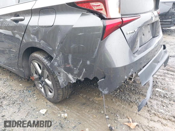 2019 Toyota Prius L Eco z VIN JTDKARFU8K3085918, wystawiony jako IAAI lot #41107891 z przebiegiem 166 295 mil mil oraz . Historia ofert i sprzedaży dostępna na DreamBid. Obrazek 6.