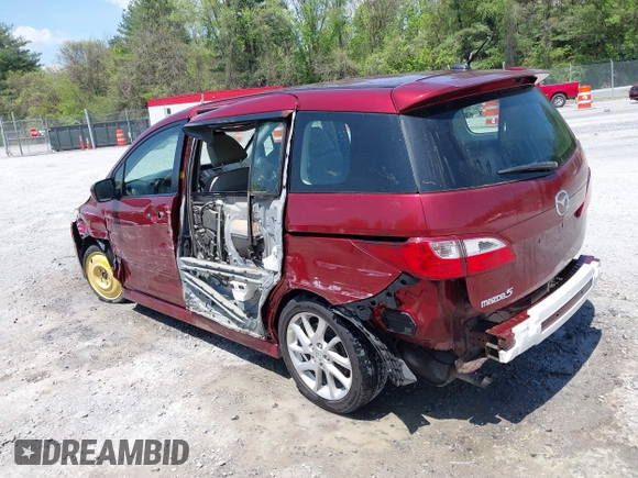 2012 Mazda 5 Grand Touring with VIN JM1CW2DL1C0123418, listed as a IAAI auction lot 42126956 with 112,411 mi miles and . Bid and sale history available at DreamBid. Image 3.
