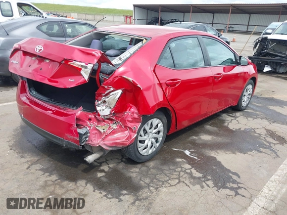 2019 Toyota Corolla L with VIN 5YFBURHE4KP883871, listed as a IAAI auction lot 41979494 with 179,078 mi miles. Bid and sale history available at carsss.com. Image 4.