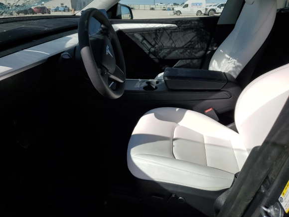 2023 Tesla Model Y Long Range with VIN 7SAYGDEE5PA100116, listed as a Copart auction lot 45713965 with 32,005 mi miles and Salvage Title. Bid and sale history available at carsss.com. Image 7.