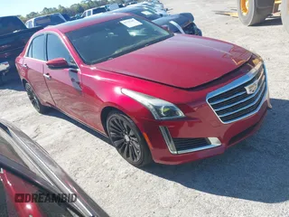 2016 Cadillac CTS Luxury Collection AWD with VIN 1G6AX5SXXG0100952, listed as a IAAI auction lot 41736200 with 123,495 mi miles and . Bid and sale history available at DreamBid. Image 1.