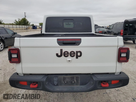 2022 Jeep Gladiator Rubicon with VIN 1C6JJTBG1NL119900, listed as a Copart auction lot 72457754 with 70,055 mi miles and Salvage title. Bid and sale history available at DreamBid. Image 6.