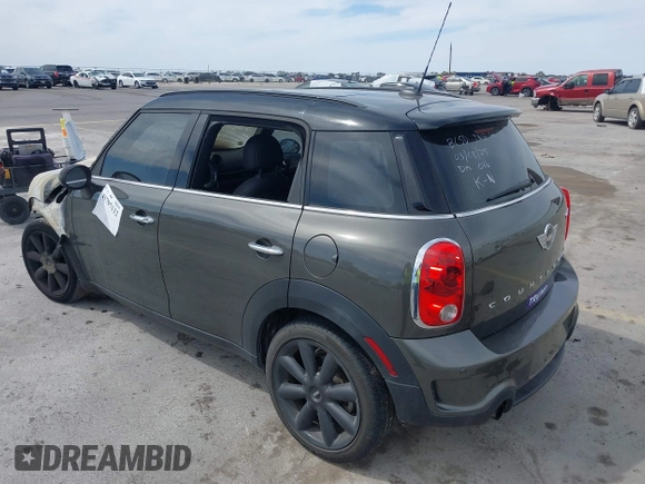 2014 MINI Countryman S with VIN WMWZC3C55EWP25697, listed as a IAAI auction lot 41797132 with Not Provided miles and . Bid and sale history available at DreamBid. Image 3.