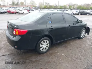 2010 Toyota Corolla with VIN 1NXBU4EE8AZ325526, listed as a IAAI auction lot 42027713 with 122,524 mi miles. Bid and sale history available at carsss.com. Image 4.