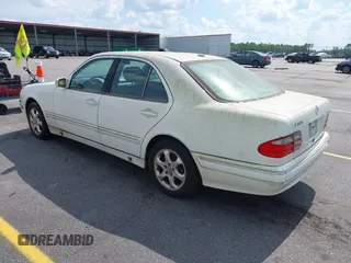 2002 Mercedes-Benz E-Class with VIN WDBJF65J22B432263, listed as a IAAI auction lot 42130545 with 220,852 mi miles. Bid and sale history available at carsss.com. Image 3.