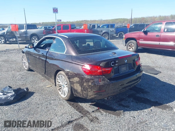 2014 BMW 4 Series 428i with VIN WBA3V7C59EJ872576, listed as a IAAI auction lot 41997699 with Not provided miles and . Bid and sale history available at DreamBid. Image 3.