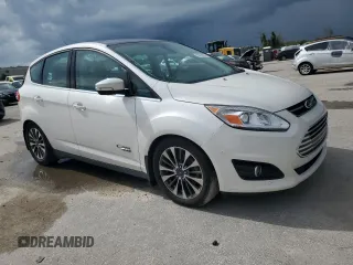 2017 Ford C-Max Energi Titanium with VIN 1FADP5FU9HL100117, listed as a Copart auction lot 69279074 with 153,601 mi miles and Salvage Title. Bid and sale history available at carsss.com. Image 4.