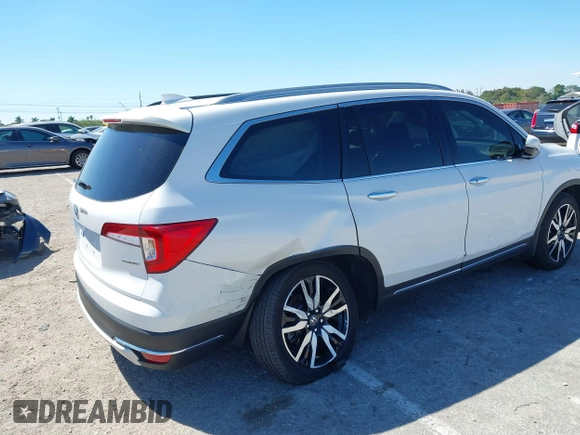2022 Honda Pilot Touring 7-Passenger с VIN 5FNYF5H66NB034248, выставлен на аукционе IAAI как лот 41777362 с пробегом 26 611 миль миль и . История ставок и продаж доступна на DreamBid. Изображение 4.