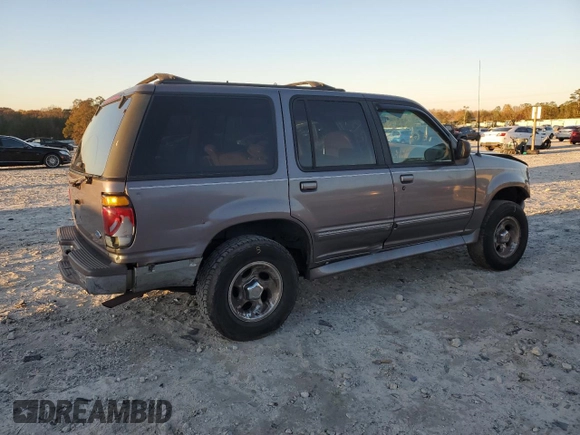 1997 Ford Explorer XL with VIN 1FMDU34XXVUC61582, listed as a Copart auction lot 81957344 with 153,852 mi miles and Salvage title. Bid and sale history available at DreamBid. Image 3.