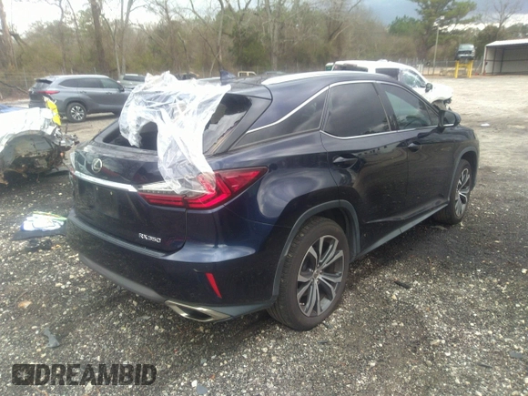 2017 Lexus RX with VIN 2T2ZZMCA4HC060546, listed as a IAAI auction lot 41734868 with 119,000 mi miles. Bid and sale history available at carsss.com. Image 4.