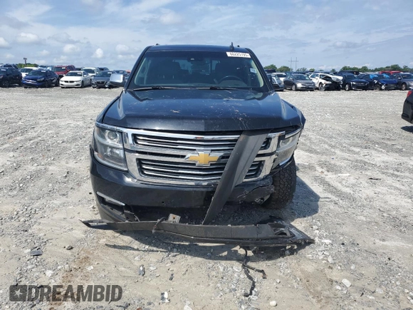 2015 Chevrolet Tahoe LTZ with VIN 1GNSCCKC2FR693500, listed as a Copart auction lot 60225195 with 206,210 mi miles and Salvage title. Bid and sale history available at DreamBid. Image 5.