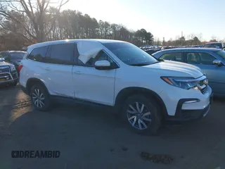 2022 Honda Pilot EX-L with VIN 5FNYF6H54NB084899, listed as a IAAI auction lot 41524725 with 35,827 mi miles and . Bid and sale history available at DreamBid. Image 13.