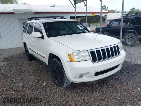 2008 Jeep Grand Cherokee Limited z VIN 1J8HS582X8C100612, wystawiony jako IAAI lot #41934146 z przebiegiem 148 852 mil mil oraz . Historia ofert i sprzedaży dostępna na DreamBid. Obrazek 1.