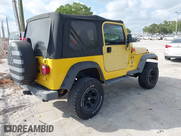 2002 Jeep Wrangler X z VIN 1J4FA39S82P719241, wystawiony jako IAAI lot #42150742 z przebiegiem 147 914 mil mil oraz . Historia ofert i sprzedaży dostępna na DreamBid. Obrazek 4.