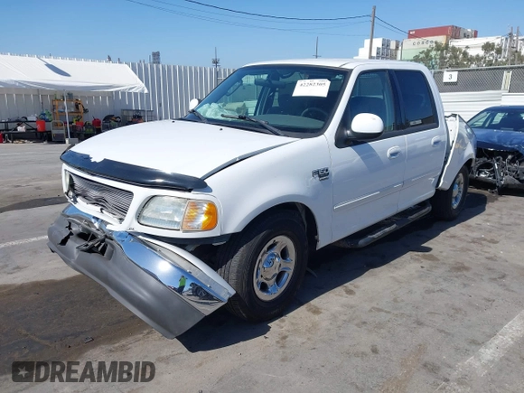 2003 Ford F-150 XLT with VIN 1FTRW07653KC82984, listed as a IAAI auction lot 42282305 with 933,470 mi miles and . Bid and sale history available at DreamBid. Image 2.