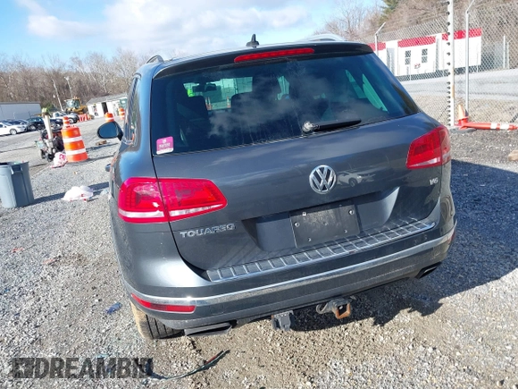 2016 Volkswagen Touareg Sport with VIN WVGEF9BP2GD005315, listed as a IAAI auction lot 41588590 with 134,709 mi miles and . Bid and sale history available at DreamBid. Image 16.