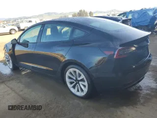 2022 Tesla Model 3 with VIN 5YJ3E1EA2NF190723, listed as a Copart auction lot 46470015 with 108,626 mi miles and Salvage Title. Bid and sale history available at DreamBid. Image 2.