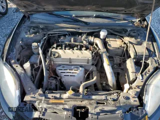 2011 Mitsubishi Eclipse GS with VIN 4A31K5DF2BE001146, listed as a Copart auction lot 80048734 with 165,284 mi miles and Salvage Title. Bid and sale history available at carsss.com. Image 12.