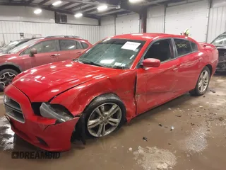 2011 Dodge Charger RT Plus with VIN 2B3CM5CT0BH517822, listed as a IAAI auction lot 41629152 with 99,449 mi miles. Bid and sale history available at carsss.com. Image 2.