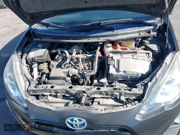 2016 Toyota Prius One with VIN JTDKDTB39G1122107, listed as a IAAI auction lot 42010864 with 68,481 mi miles and . Bid and sale history available at DreamBid. Image 10.