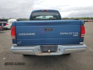 2004 Dodge Dakota SLT z VIN 1D7HG48K04S739865, wystawiony jako Copart lot #57867265 z przebiegiem 214 698 mil mil oraz Tytuł czysty. Historia ofert i sprzedaży dostępna na DreamBid. Obrazek 6.