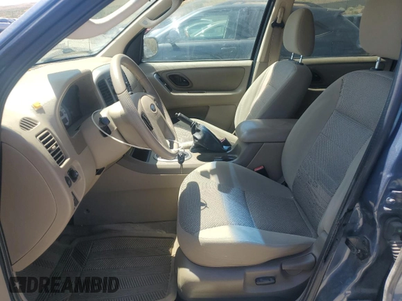 2005 Ford Escape XLT with VIN 1FMCU93105KA43061, listed as a Copart auction lot 62324555 with 121,517 mi miles and Salvage title. Bid and sale history available at DreamBid. Image 7.