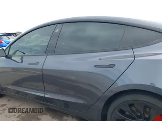 2022 Tesla Model 3 Performance with VIN 5YJ3E1EC3NF296891, listed as a IAAI auction lot 41808329 with 82,682 mi miles and . Bid and sale history available at DreamBid. Image 14.