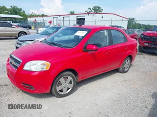 2011 Chevrolet Aveo 1LT with VIN KL1TD5DEXBB141242, listed as a IAAI auction lot 42573592 with 118,173 mi miles and . Bid and sale history available at DreamBid. Image 2.
