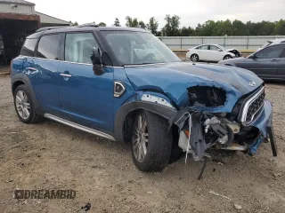 2018 MINI Countryman Cooper S with VIN WMZYT3C39J3E93309, listed as a Copart auction lot 60558285 with 50,907 mi miles and Salvage title. Bid and sale history available at DreamBid. Image 4.