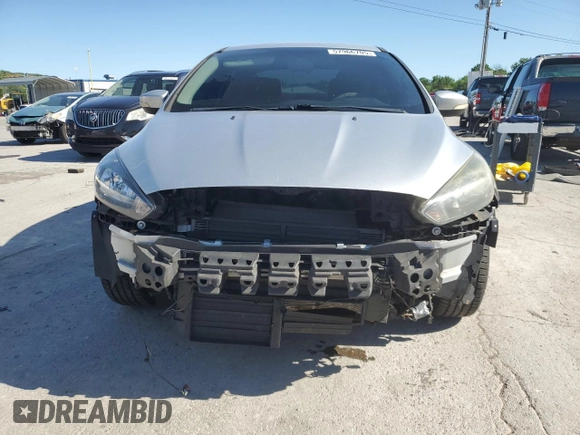 2015 Ford Focus SE z VIN 1FADP3F25FL283595, wystawiony jako Copart lot #57966705 z przebiegiem 182 405 mil mil oraz Szkoda całkowita • Salvage title. Historia ofert i sprzedaży dostępna na DreamBid. Obrazek 5.