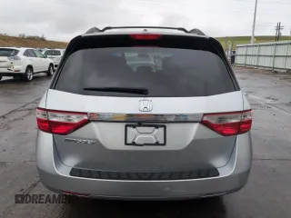 2012 Honda Odyssey EX-L with VIN 5FNRL5H68CB141022, listed as a Copart auction lot 54605485 with 185,388 mi miles and Salvage Title. Bid and sale history available at carsss.com. Image 6.