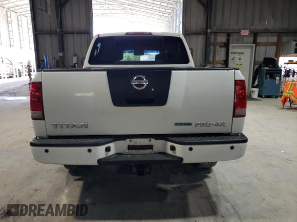 2010 Nissan Titan Pro-4X with VIN 1N6BA0EC3AN312601, listed as a Copart auction lot 52633455 with 161,260 mi miles and Salvage title. Bid and sale history available at DreamBid. Image 6.