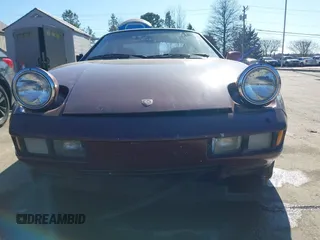 1984 Porsche 928 z VIN WP0JB0925ES860300, wystawiony jako IAAI lot #41581309 z przebiegiem 115 151 mil mil oraz . Historia ofert i sprzedaży dostępna na DreamBid. Obrazek 11.