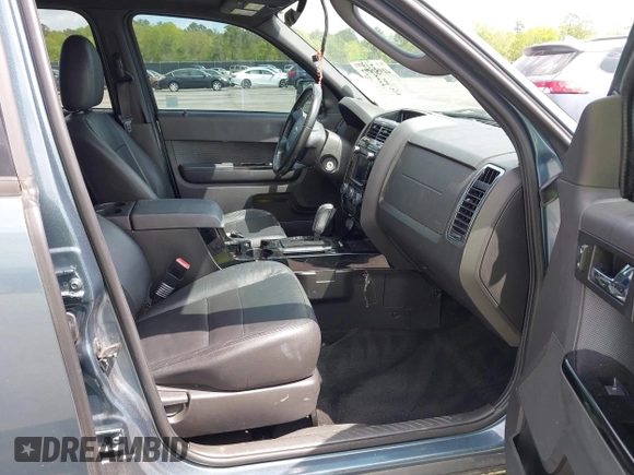 2011 Ford Escape Limited with VIN 1FMCU0E78BKB28559, listed as a IAAI auction lot 41951972 with 213,913 mi miles. Bid and sale history available at carsss.com. Image 5.