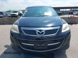 2011 Mazda CX-9 Sport with VIN JM3TB2BA7B0303120, listed as a IAAI auction lot 42427053 with 219,673 mi miles and . Bid and sale history available at DreamBid. Image 12.
