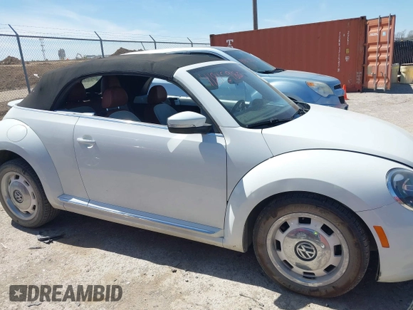 2015 Volkswagen Beetle 1.8T w/Tech with VIN 3VW517AT9FM810122, listed as a IAAI auction lot 41815980 with 72,420 mi miles and . Bid and sale history available at DreamBid. Image 13.