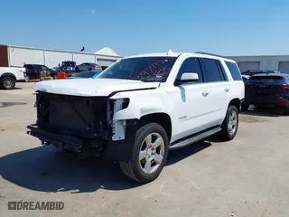 2016 Chevrolet Tahoe LT with VIN 1GNSCBKC9GR463027, listed as a IAAI auction lot 39799507 with 116,132 mi miles. Bid and sale history available at carsss.com. Image 18.