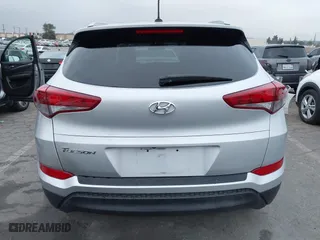 2016 Hyundai Tucson SE with VIN KM8J33A47GU242183, listed as a IAAI auction lot 41772964 with 97,527 mi miles. Bid and sale history available at carsss.com. Image 15.