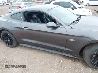 2020 Ford Mustang EcoBoost with VIN 1FA6P8TD1L5184204, listed as a IAAI auction lot 42421848 with 94,492 mi miles and . Bid and sale history available at DreamBid. Image 6.