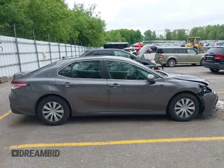 2019 Toyota Camry Hybrid LE z VIN 4T1B31HK4KU511360, wystawiony jako IAAI lot #42298260 z przebiegiem 133 019 mil mil oraz . Historia ofert i sprzedaży dostępna na DreamBid. Obrazek 13.