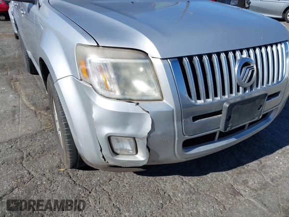2011 Mercury Mariner z VIN 4M2CN8B70BKJ04853, wystawiony jako IAAI lot #41345383 z przebiegiem 259 727 mil mil oraz . Historia ofert i sprzedaży dostępna na DreamBid. Obrazek 6.