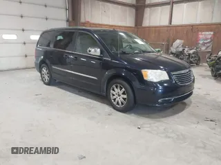 2011 Chrysler Town & Country Touring-L with VIN 2A4RR8DG6BR739802, listed as a IAAI auction lot 41893479 with 143,541 mi miles. Bid and sale history available at carsss.com. Image 1.