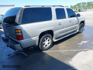 2004 GMC Yukon XL Denali with VIN 1GKFK66U24J283006, listed as a IAAI auction lot 42003275 with 348,268 mi miles. Bid and sale history available at carsss.com. Image 4.