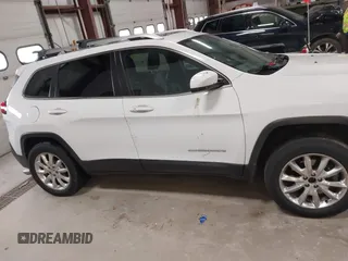 2014 Jeep Cherokee Limited with VIN 1C4PJMDS1EW235980, listed as a IAAI auction lot 41994044 with 128,292 mi miles and . Bid and sale history available at DreamBid. Image 14.
