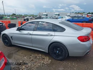2015 BMW 4 Series 428i xDrive with VIN WBA4C9C50FD330482, listed as a IAAI auction lot 42116547 with 192,739 mi miles and . Bid and sale history available at DreamBid. Image 14.