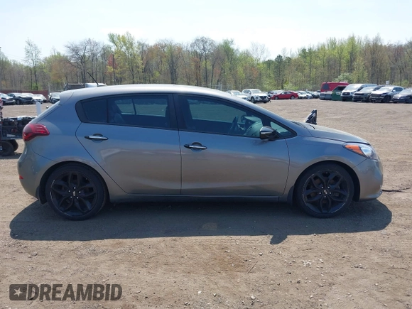 2015 Kia Forte 5-Door SX with VIN KNAFZ5A35F5266838, listed as a IAAI auction lot 42115081 with 80,983 mi miles. Bid and sale history available at carsss.com. Image 13.