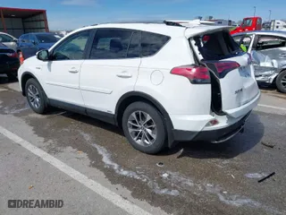 2016 Toyota RAV4 Hybrid XLE with VIN JTMRJREV1GD017731, listed as a IAAI auction lot 41860447 with 115,787 mi miles. Bid and sale history available at carsss.com. Image 3.