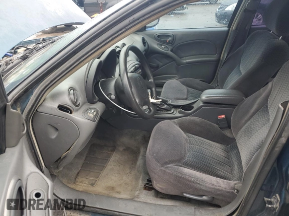 2002 Pontiac Grand Am SE z VIN 1G2NE52F92C172605, wystawiony jako Copart lot #56541555 z przebiegiem 164 600 mil mil oraz Szkoda całkowita • Salvage title. Historia ofert i sprzedaży dostępna na DreamBid. Obrazek 7.