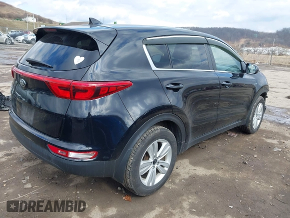 2018 Kia Sportage LX with VIN KNDPMCAC3J7380179, listed as a IAAI auction lot 41672067 with 134,390 mi miles. Bid and sale history available at carsss.com. Image 4.